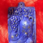 “Bassorilievo frutta” Ceramica patinata con cera d’api, 18x12x3 cm