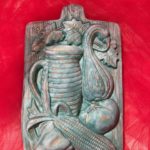 “Bassorilievo legumi” Ceramica patinata con cera d’api 18x12x3 cm
